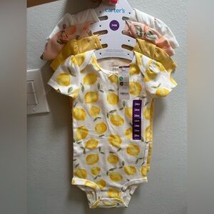 NWT Carter’s 4piece lemon strawberry Onesies 24months